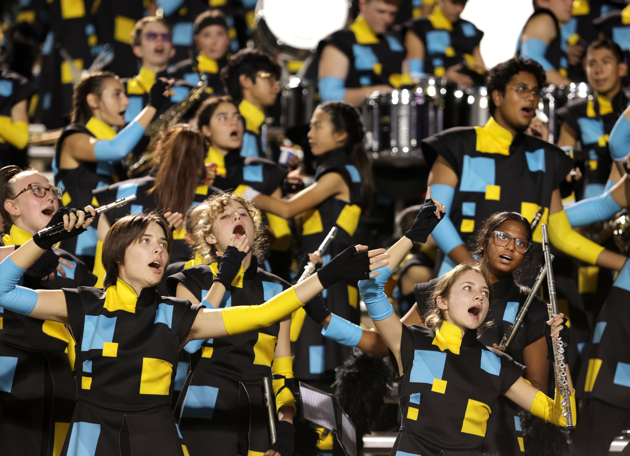 The Prosper band sings along to Neil Diamond during the Prosper High School at Allen High...