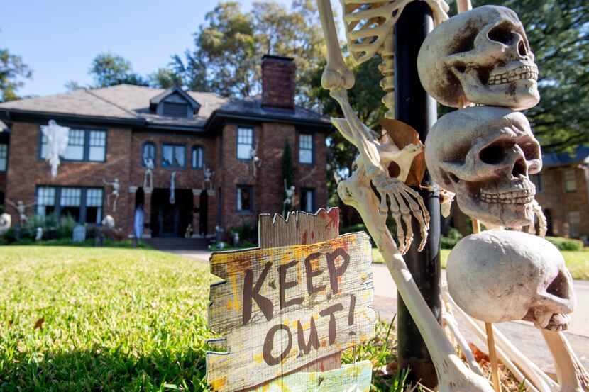 Halloween decorations adorn the front yard of a home on Dallas' Swiss Avenue on Wednesday. ...