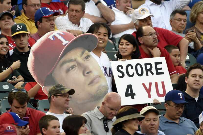Yu Darvish fans cheer for fun support as the Texas Rangers played the Oakland Athletics...