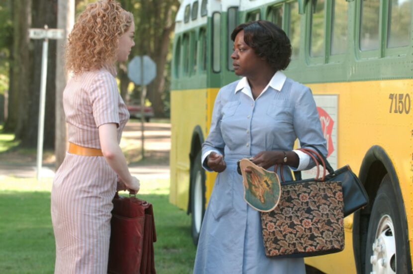 Emma Stone and Viola Davis are shown in a scene from "The Help."