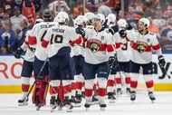 Florida Panthers players celebrate their win over the Edmonton Oilers in Game 3 of the NHL...