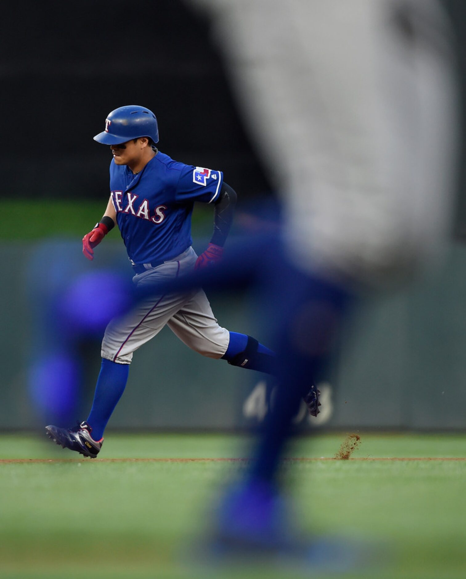 MINNEAPOLIS, MN - JUNE 22: Shin-Soo Choo #17 and Ronald Guzman #67 of the Texas Rangers...