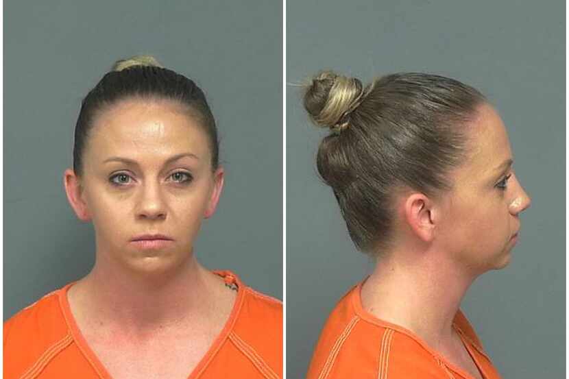 Amber Guyger, 30, was booked into the Mesquite Jail on Friday and quickly released on bond.