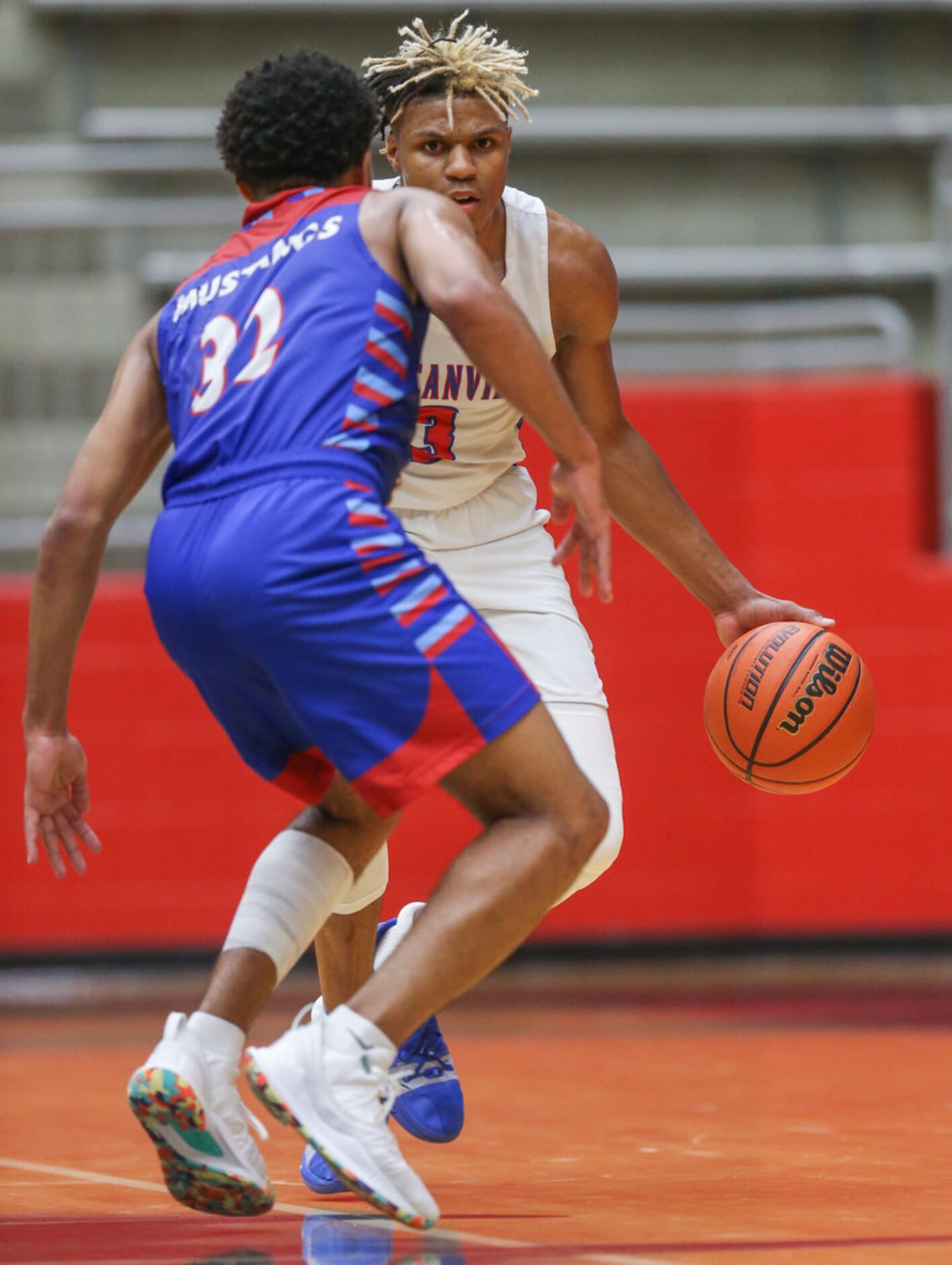 Duncanville guard Jahmius Ramsey (3) drives the ball past J. J. Pearce guard Braeson...