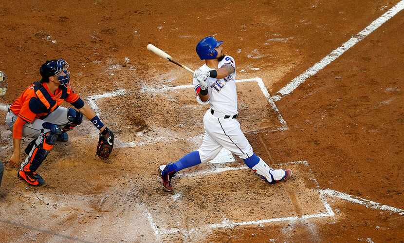  Texas Rangers second baseman Rougned Odor (12) smashes a two-run homer to the Home Run...