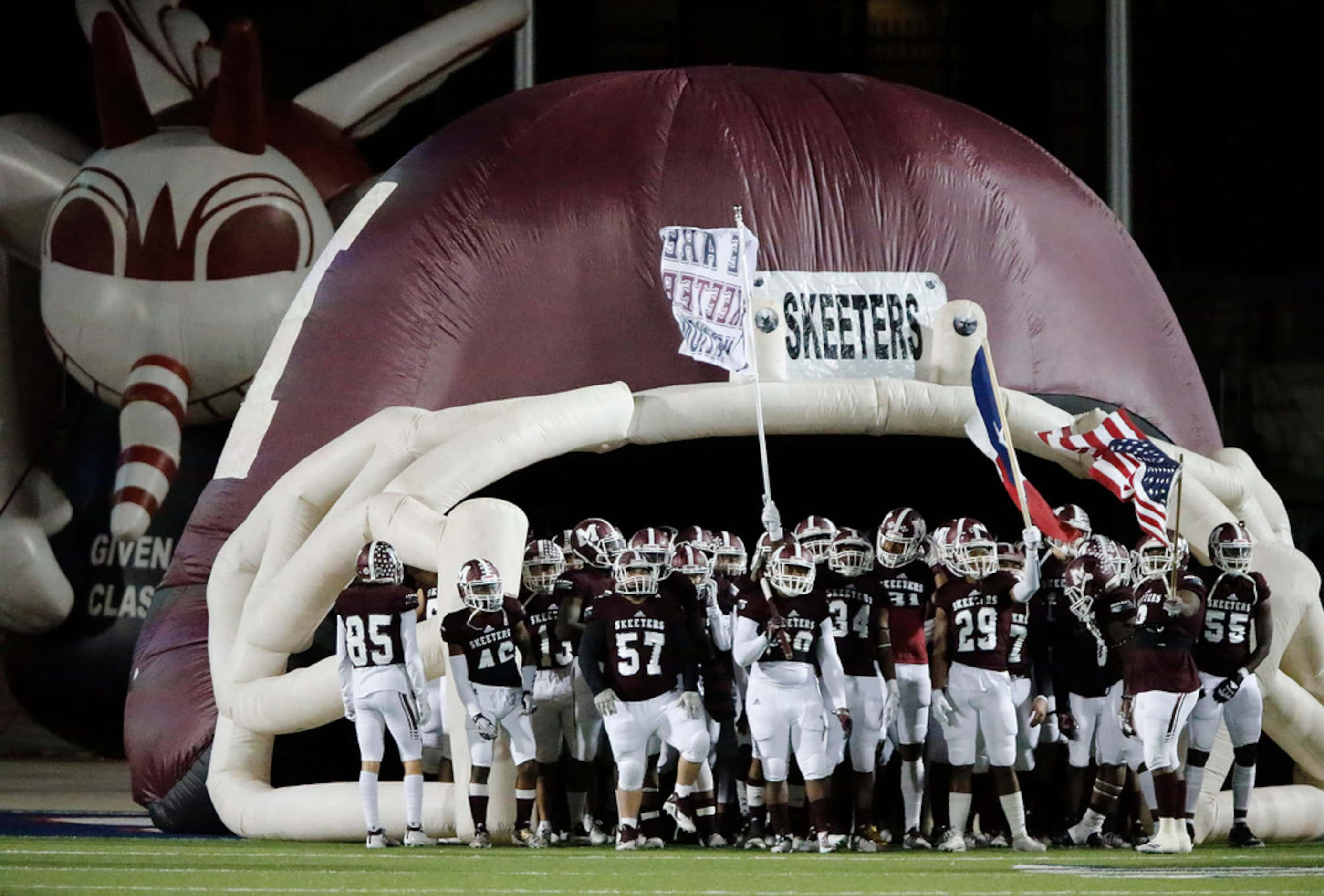 The Mesquite High School football team prepares to take the field before kick off  as...