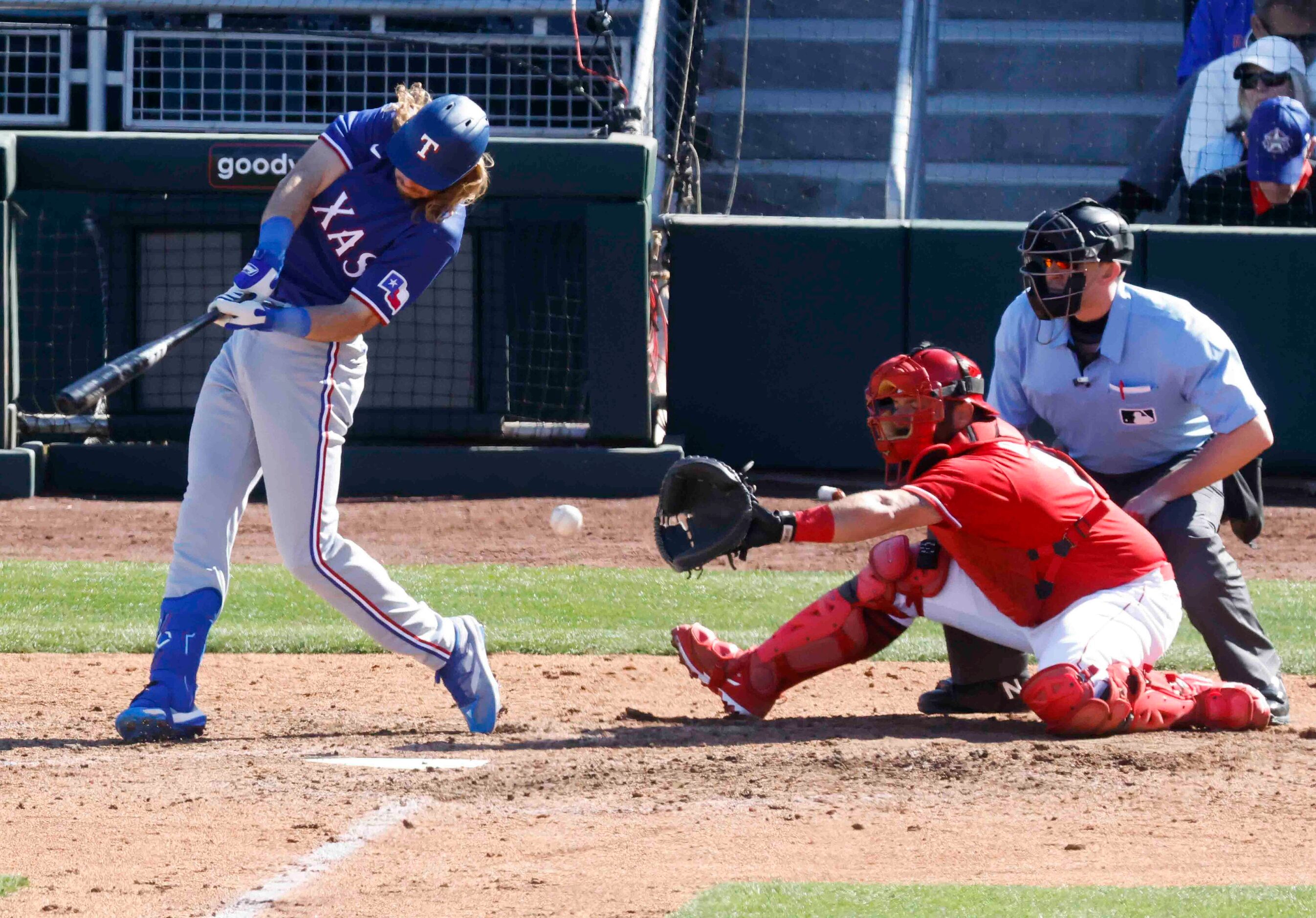 Texas Rangers right fielder Travis Jankowski strikes out during the fourth inning of a...