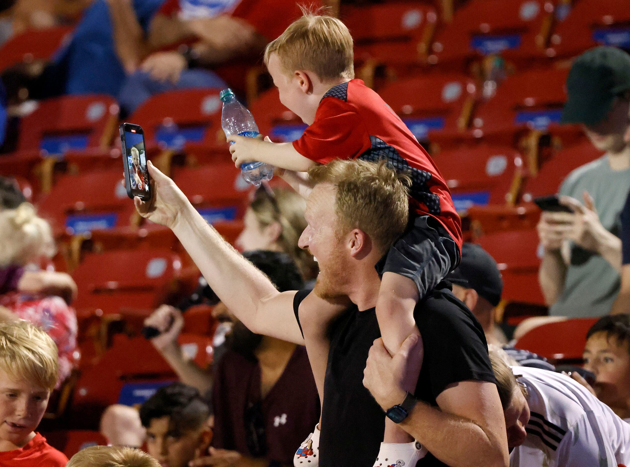 FC Dallas fans celebrate Bernard Kamungo’s first half goal against the Charlotte FC in a...