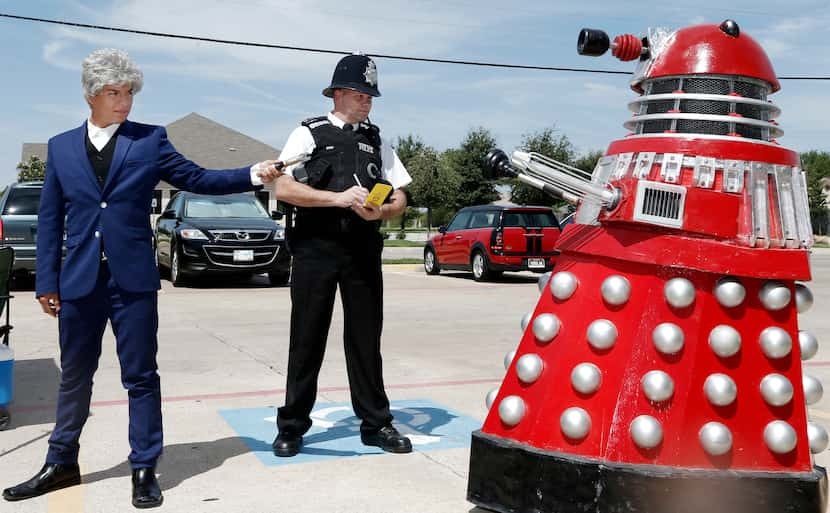 "Doctor Who" fans in costume confront a replica Dalek during the 2014 Doctor Who Day...