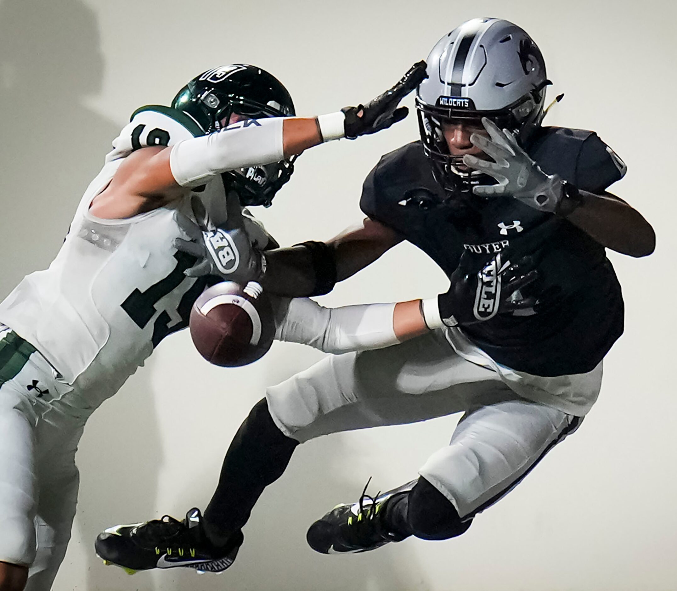 Prosper defensive back Bo Mongaras (19) breaks up a pass intended for Denton Guyer wide...