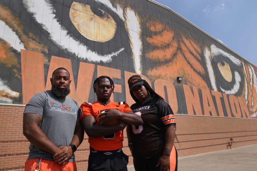 Lancaster senior wide receiver Ti' Erick Martin is flanked by his mother, La' Tashia Gaston...