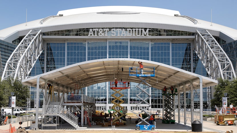 Construction workers finished up on the new Corral at AT&T Stadium in Arlington on Aug. 13,...