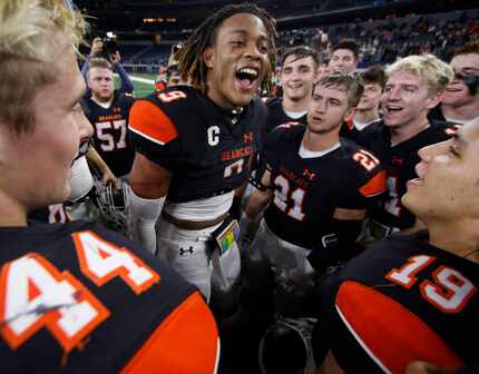 Aledo senior running back Jase McClellan (9) was in the center of the celebration following...