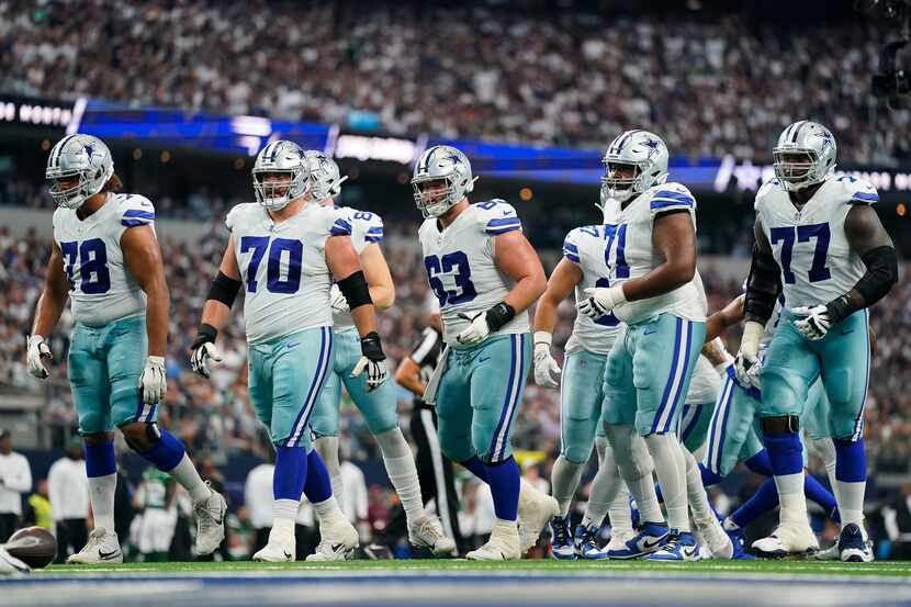 Dallas Cowboys offensive tackle Terence Steele (78), guard Zack Martin (70), center Tyler...