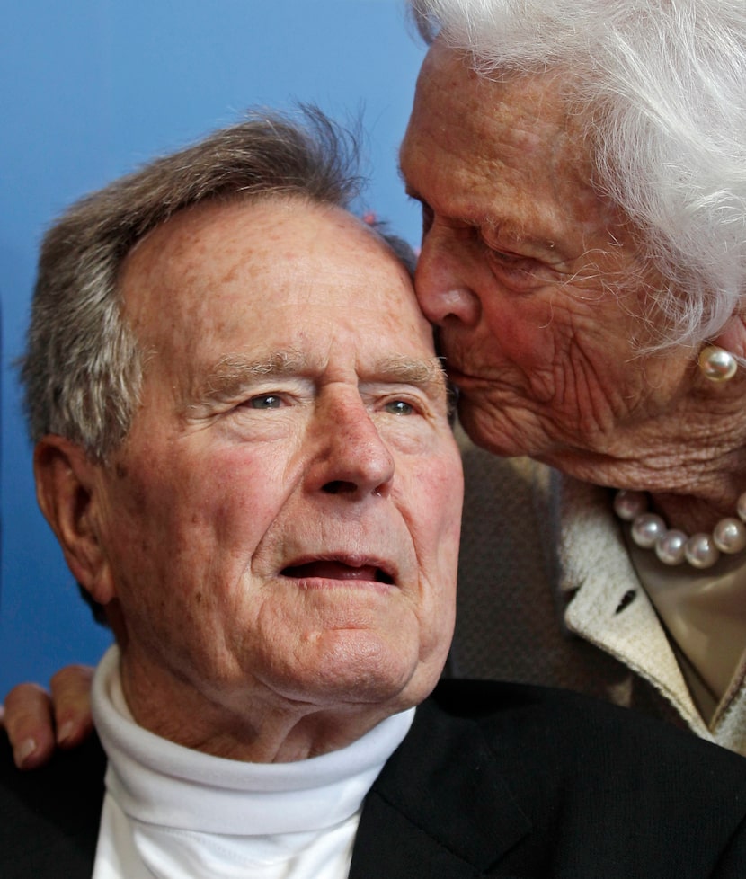 2012: Former President George H.W. Bush and his wife, Barbara, arrive for the premiere of...