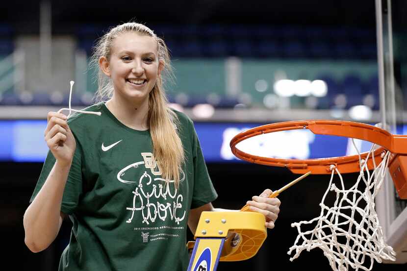 Baylor's Lauren Cox celebrates the team's win over Iowa in a regional final on Monday. (AP...