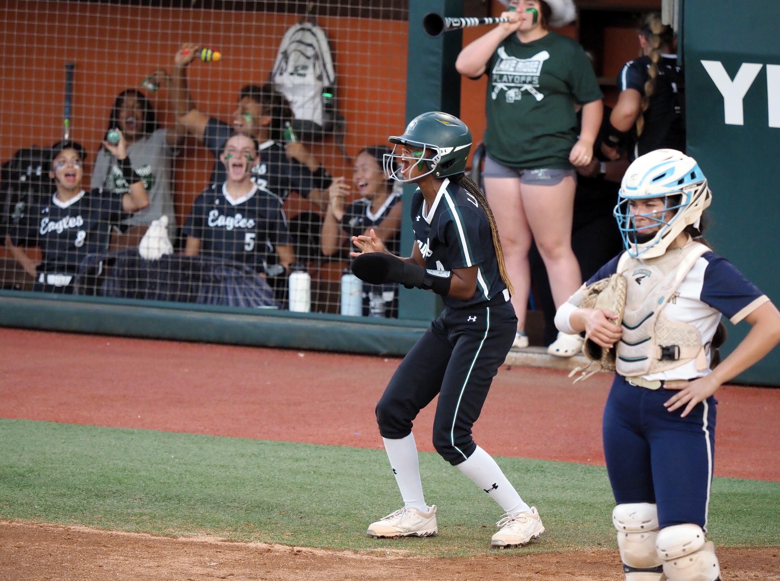 Mansfield Lake Ridge baserunner Kassidy Chance reacts after scoring a run against Northside...