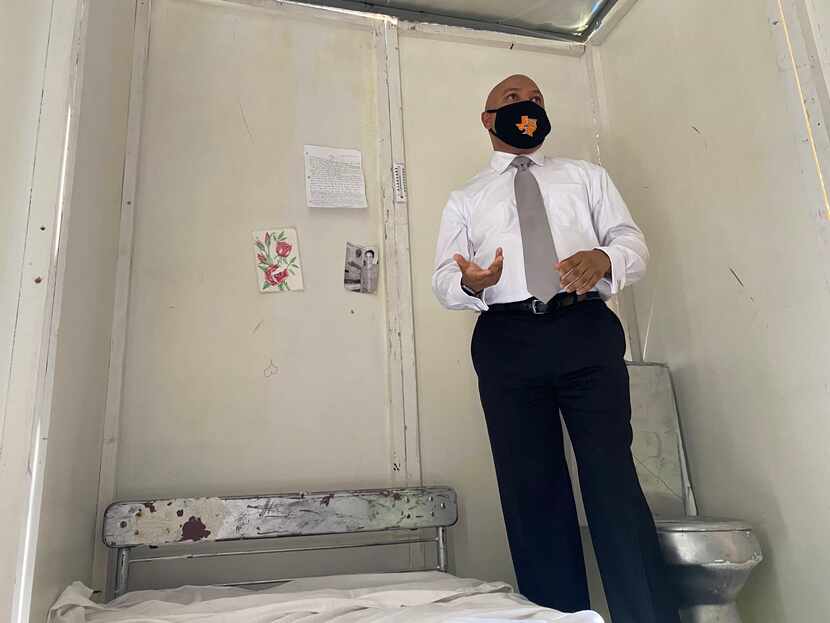 Rep. Carl O. Sherman, Sr., D-DeSoto, stands inside a mock cell the Texas Prison Air...