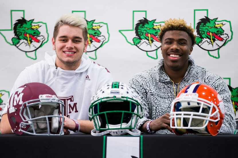 Southlake Carroll football players Blake Smith (left) and RJ Mickens pose for a photo after...