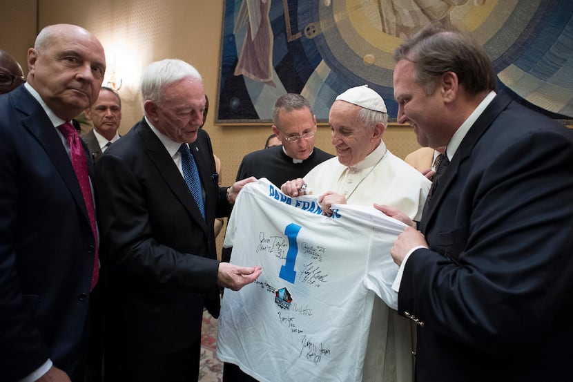 Pope Francis is presented with a Pro Football Hall of Fame jersey bearing his name by Dallas...