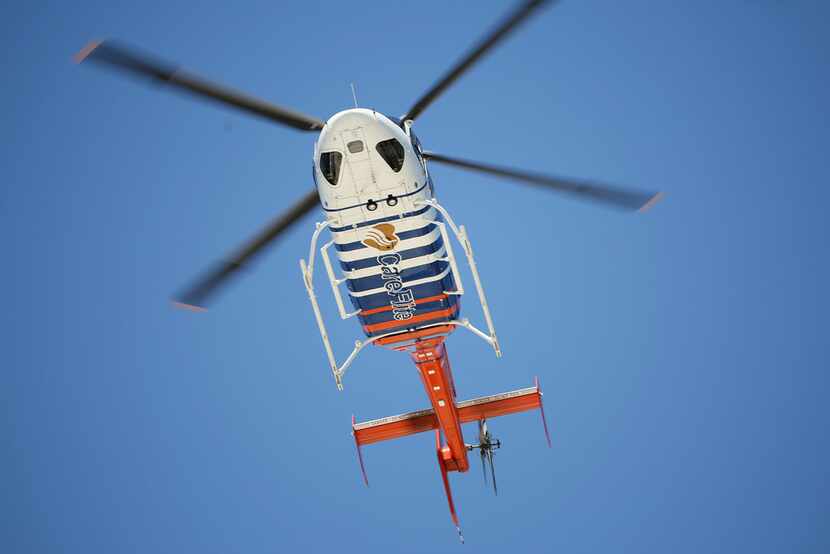 A CareFlite helicopter flies above the Baylor University Medical Center in Dallas Monday May...