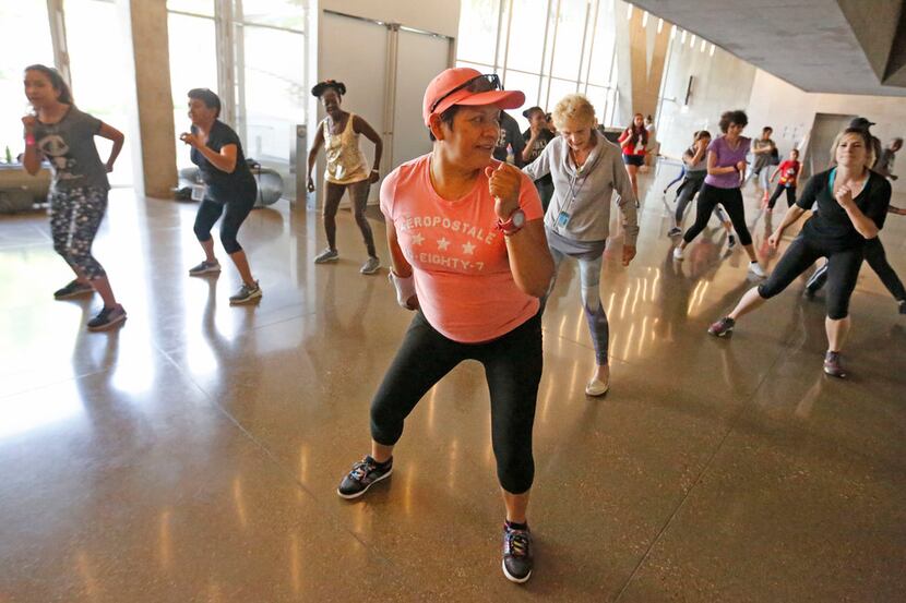 Sandra Gonzalez, front, practices dance steps during a rehearsal for Public Works Dallas, a...
