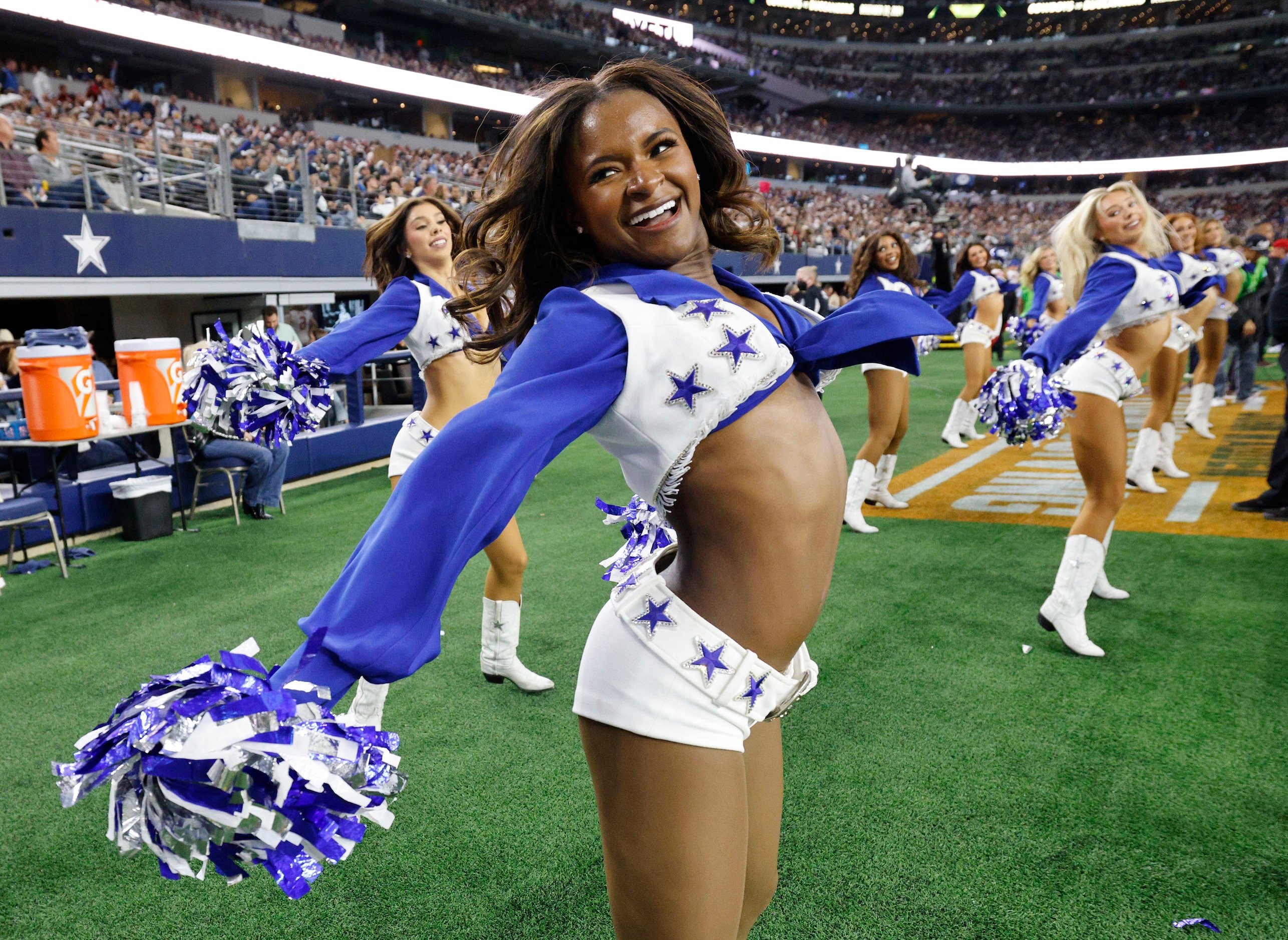 Dallas Cowboys cheerleaders perform in the first half of an NFL football game  against the...