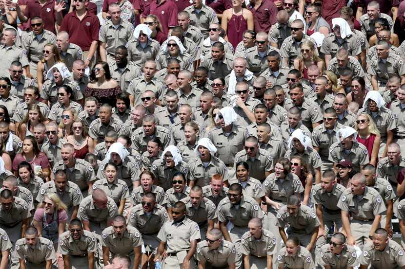 Members of the Texas A&M Corps of Cadets chant yells during the second quarter of an NCAA...
