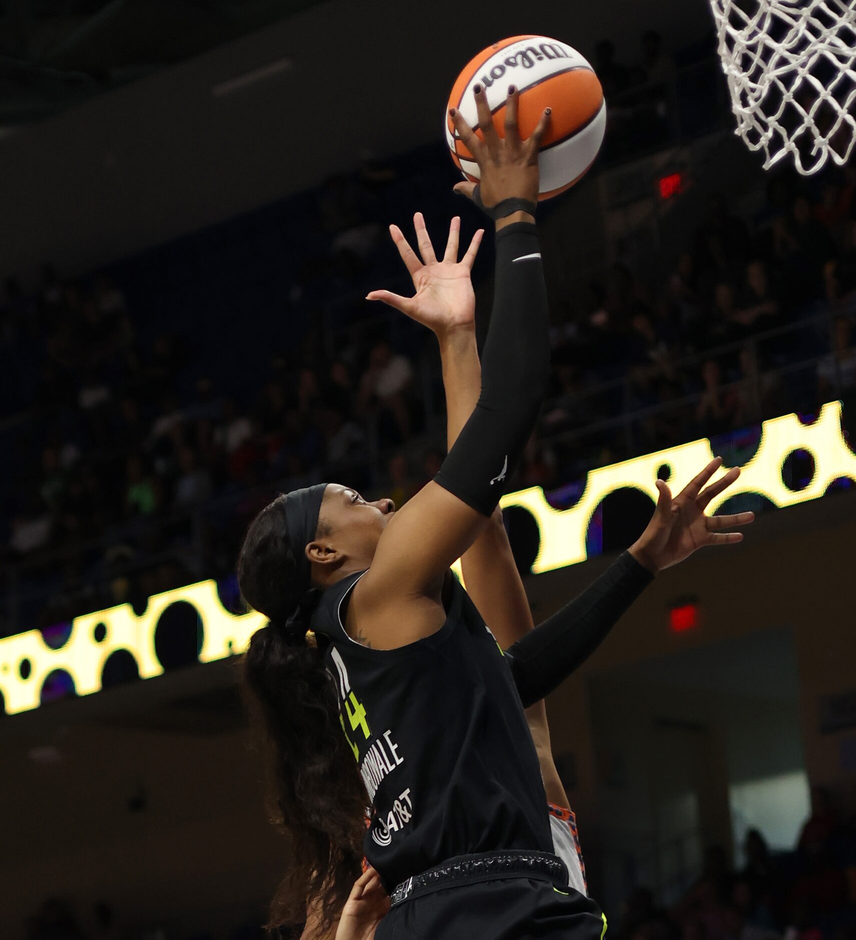 Dallas Wings guard Arike Ogunbowale (24) drives to the basket during first half action...