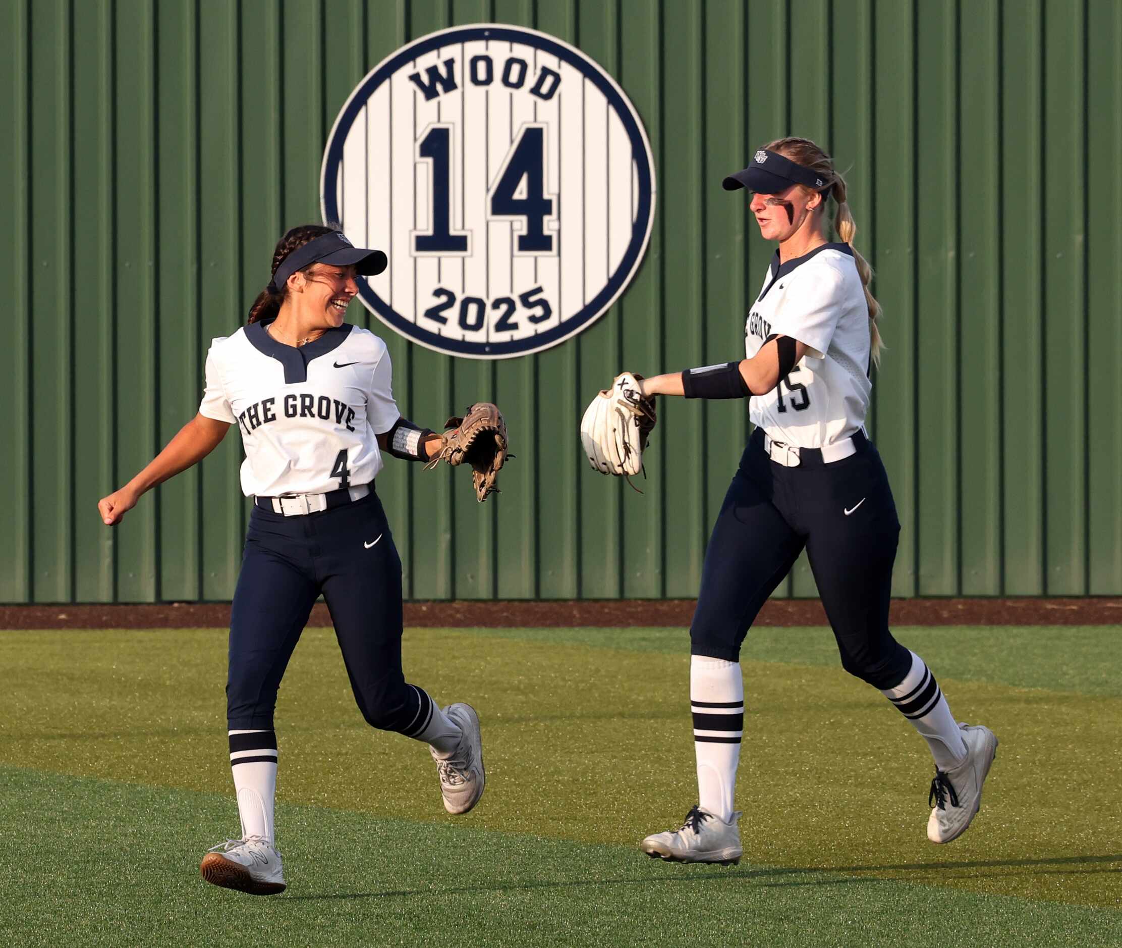 Prosper Walnut Grove right fielder Penelope Robles (4), left, was all smiles after catching...