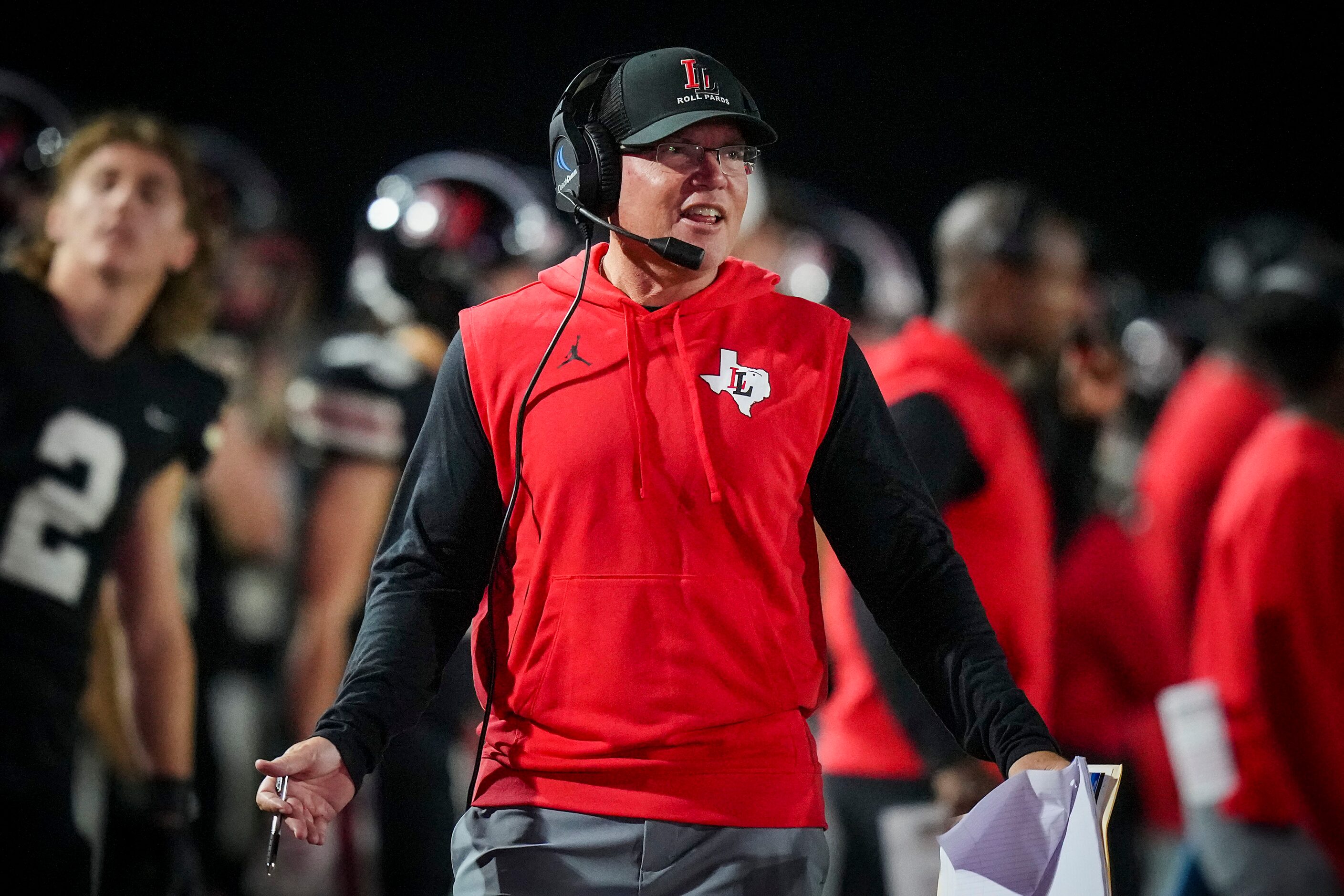 Lovejoy head coach Chris Ross reacts to a call during the first half of a District 7-5A...