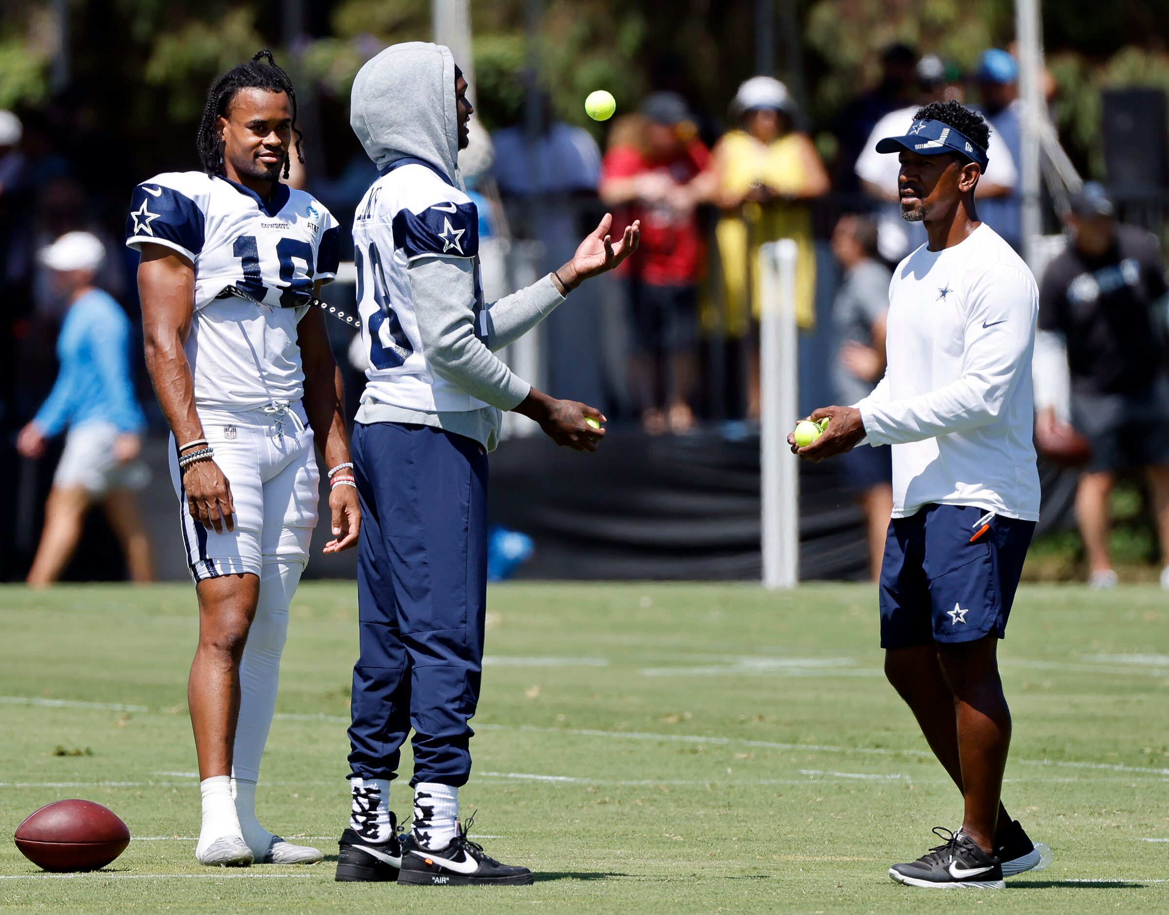 Dallas Cowboys wide receiver CeeDee Lamb (88) works on his juggling skills with receivers...