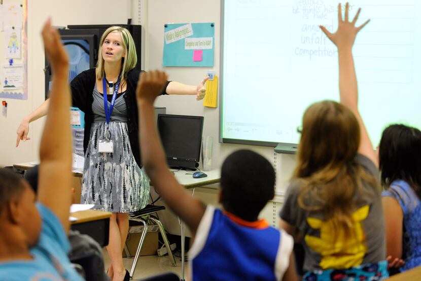 In this Oct. 1, 2013, file photo, Amy Lawson, a fifth-grade teacher at Silver Lake...