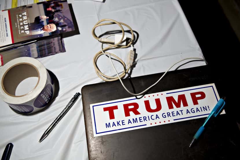 A campaign sticker supporting Donald Trump, 2016 Republican presidential nominee, sits on a...