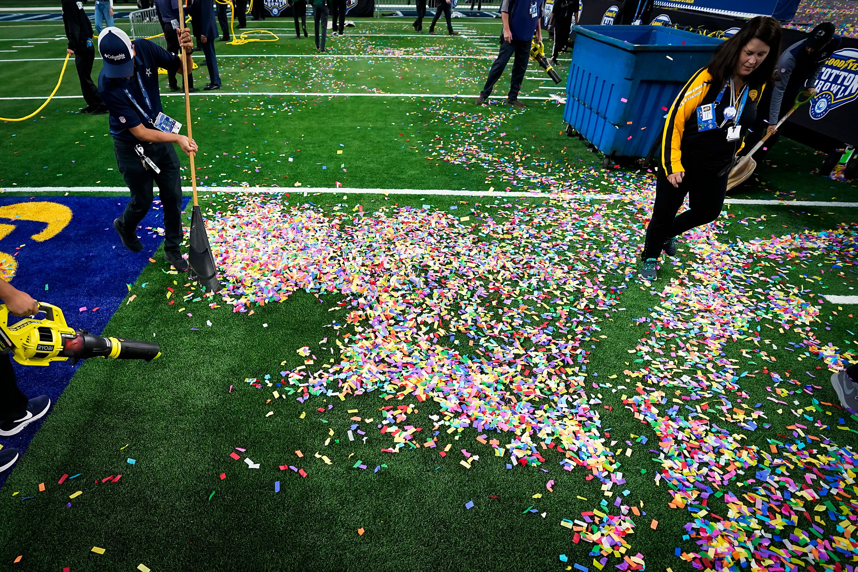 Stadium personel clean up confetti after the Penn State Nittany Lions 53-39 victory over...