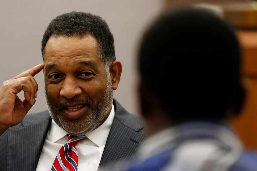 Judge George Ashford talks to a boy from the diversion male court at the Henry Wade Juvenile...