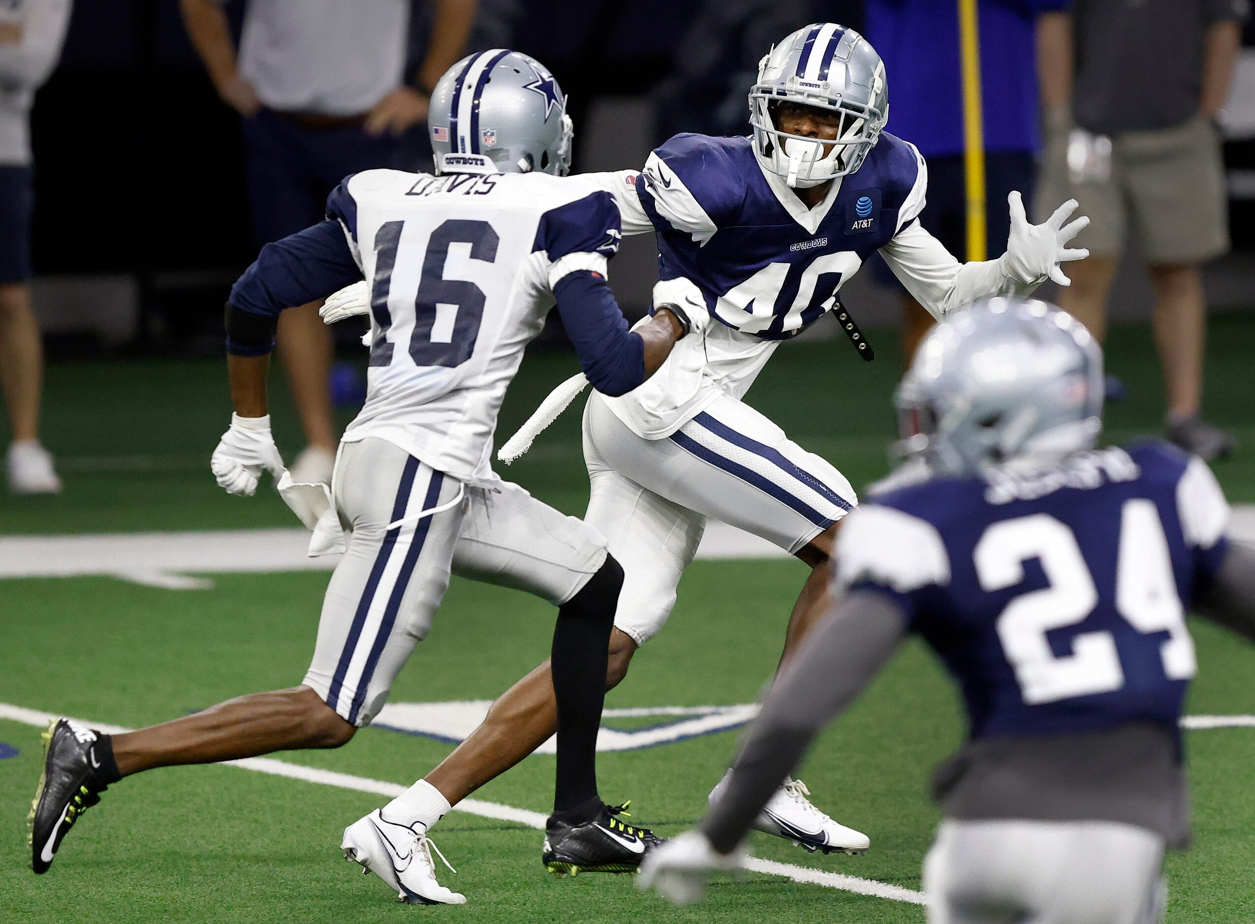 Dallas Cowboys cornerback Nahshon Wright (40) covers wide receiver Reggie Davis (16) during...