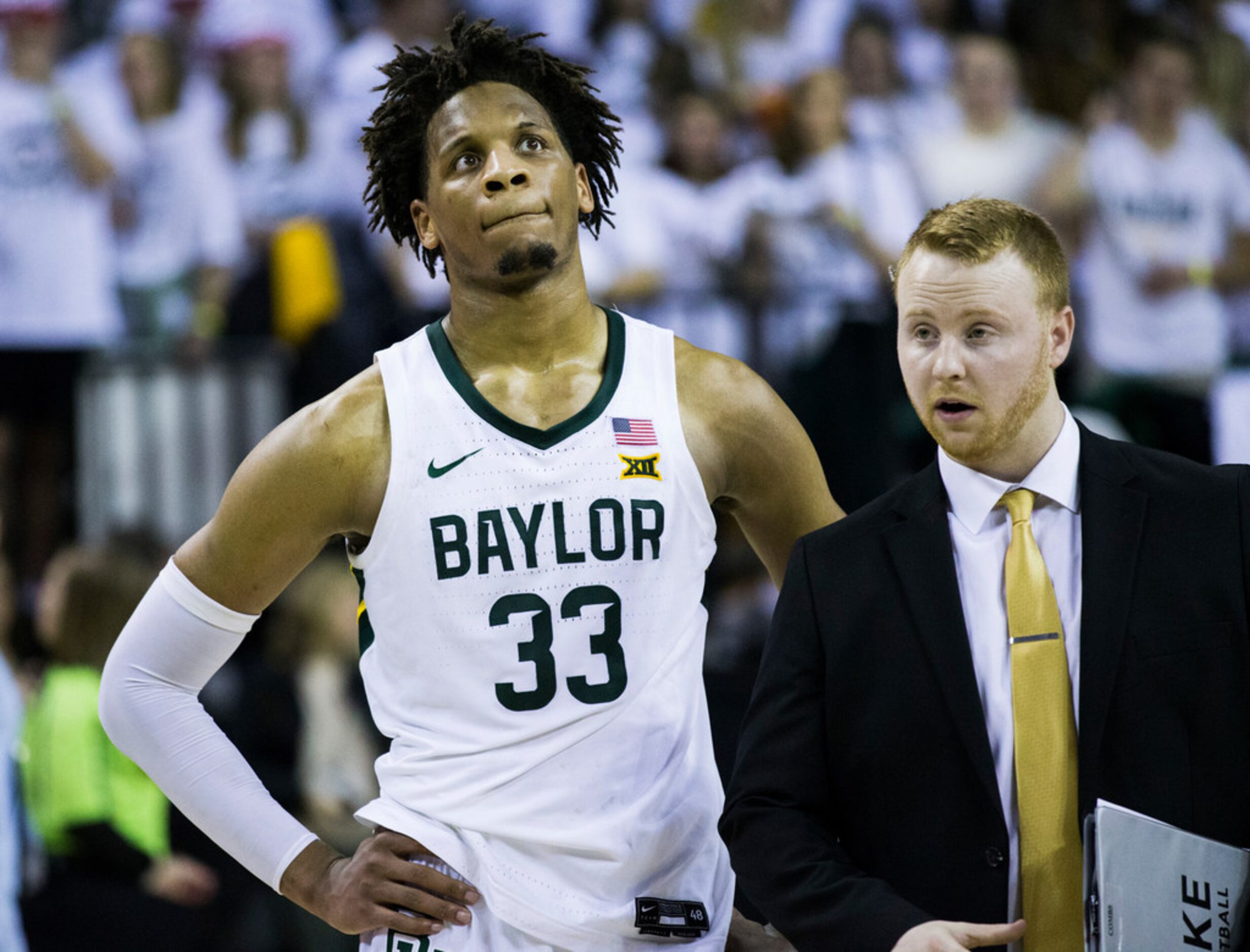 Baylor Bears forward Freddie Gillespie (33) reacts to a 64-61 loss to Kansas Jayhawks after...