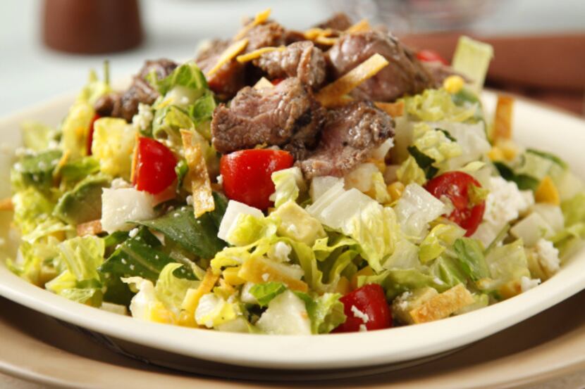 The secret to this salad from Bumble Bee's Baja Grill in Santa Fe, N.M., is the bright,...