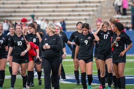 Flower Mound Marcus soccer coach Erin Smith leading her team while pregnant with her daughter.