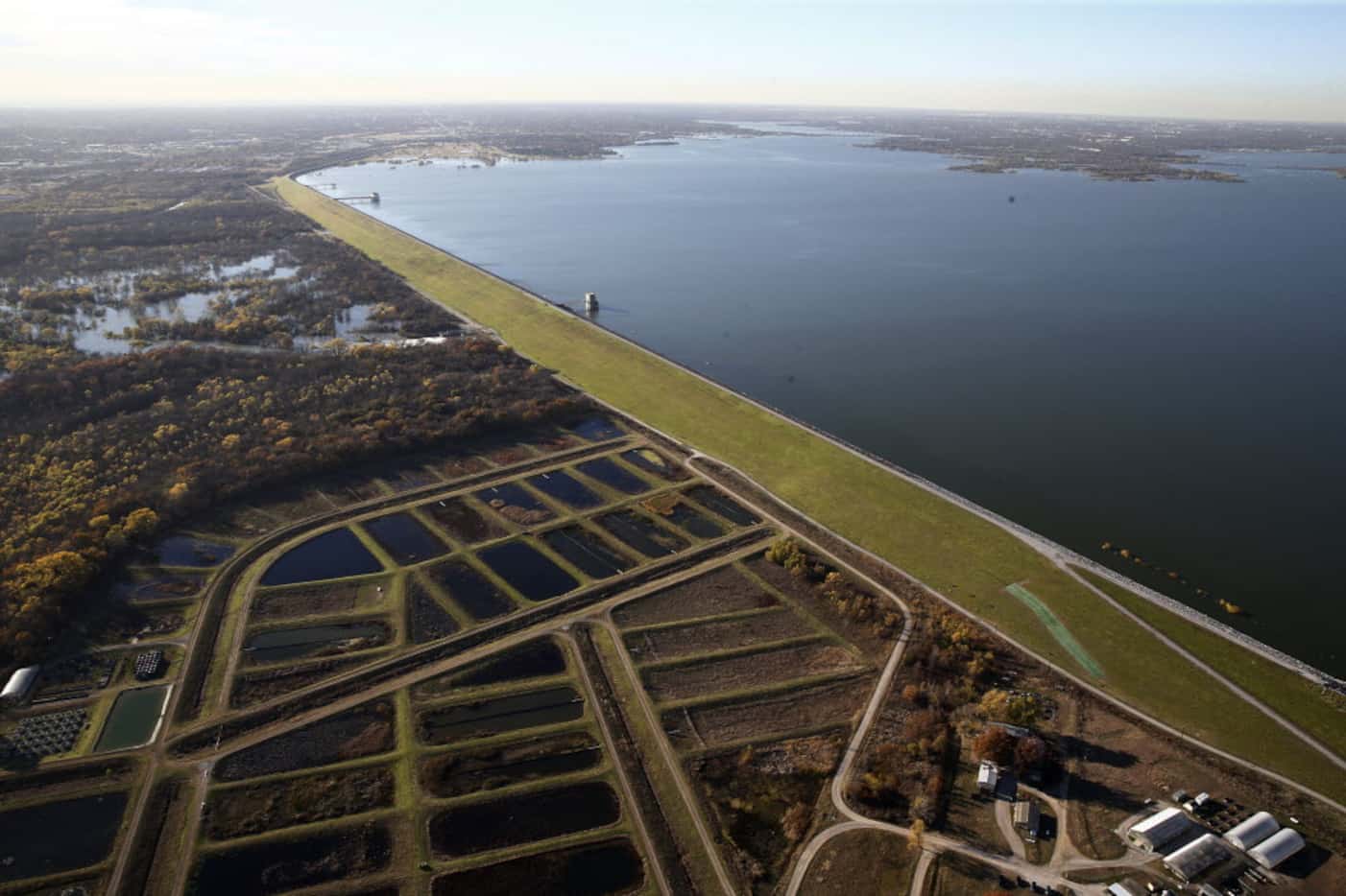 A view of the 6.2-mile long Lewisville Dam with wetlands and the University of North Texas...