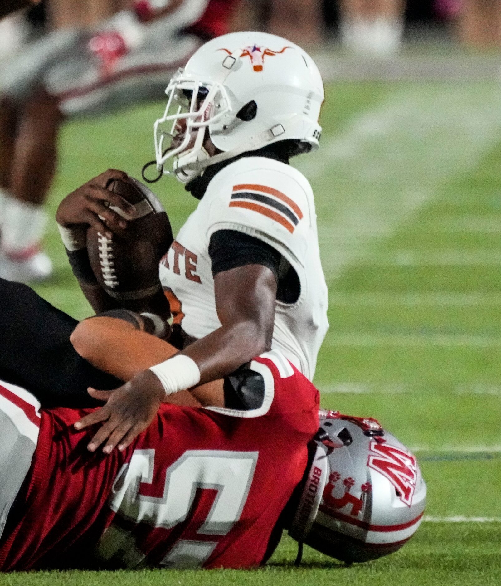 Woodrow Wilson senior defensive lineman Giancarlo Cordero (57) sacks W.T. White quarterback...