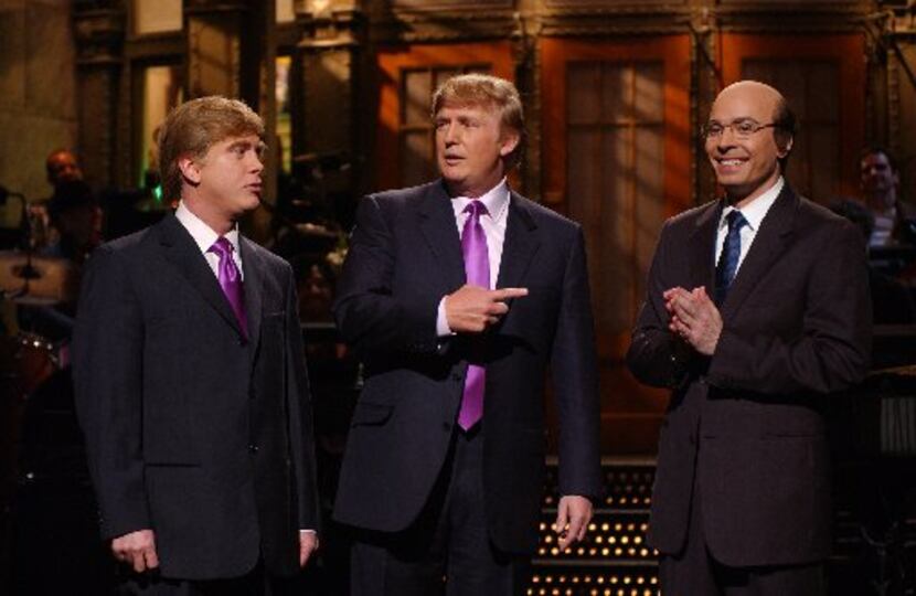  Saturday Night Live guest host Donald Trump, center, introduces cast member Darrell...