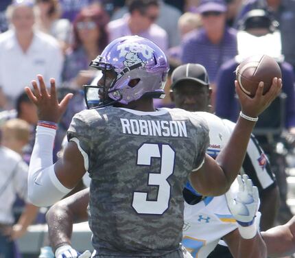 TCU quarterback Shawn Robinson (3) delivers a pass during first half action against...