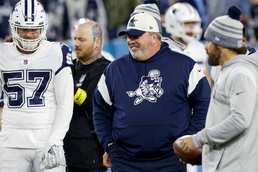 Dallas Cowboys head coach Mike McCarthy laughs during warm ups before an NFL game against...