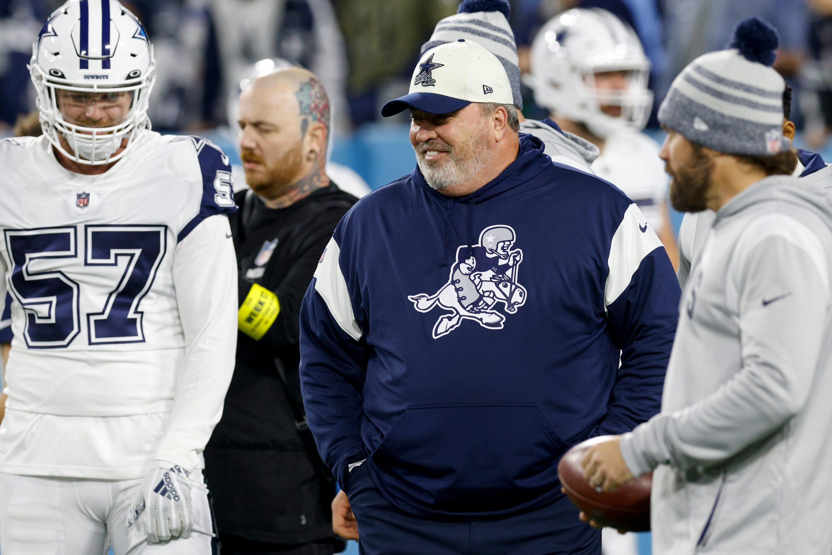 Dallas Cowboys head coach Mike McCarthy laughs during warm ups before an NFL game against...