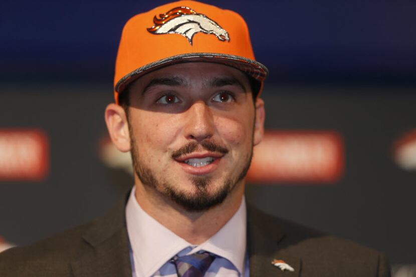 Denver Broncos' first-round selection in the NFL football draft quarterback Paxton Lynch,...