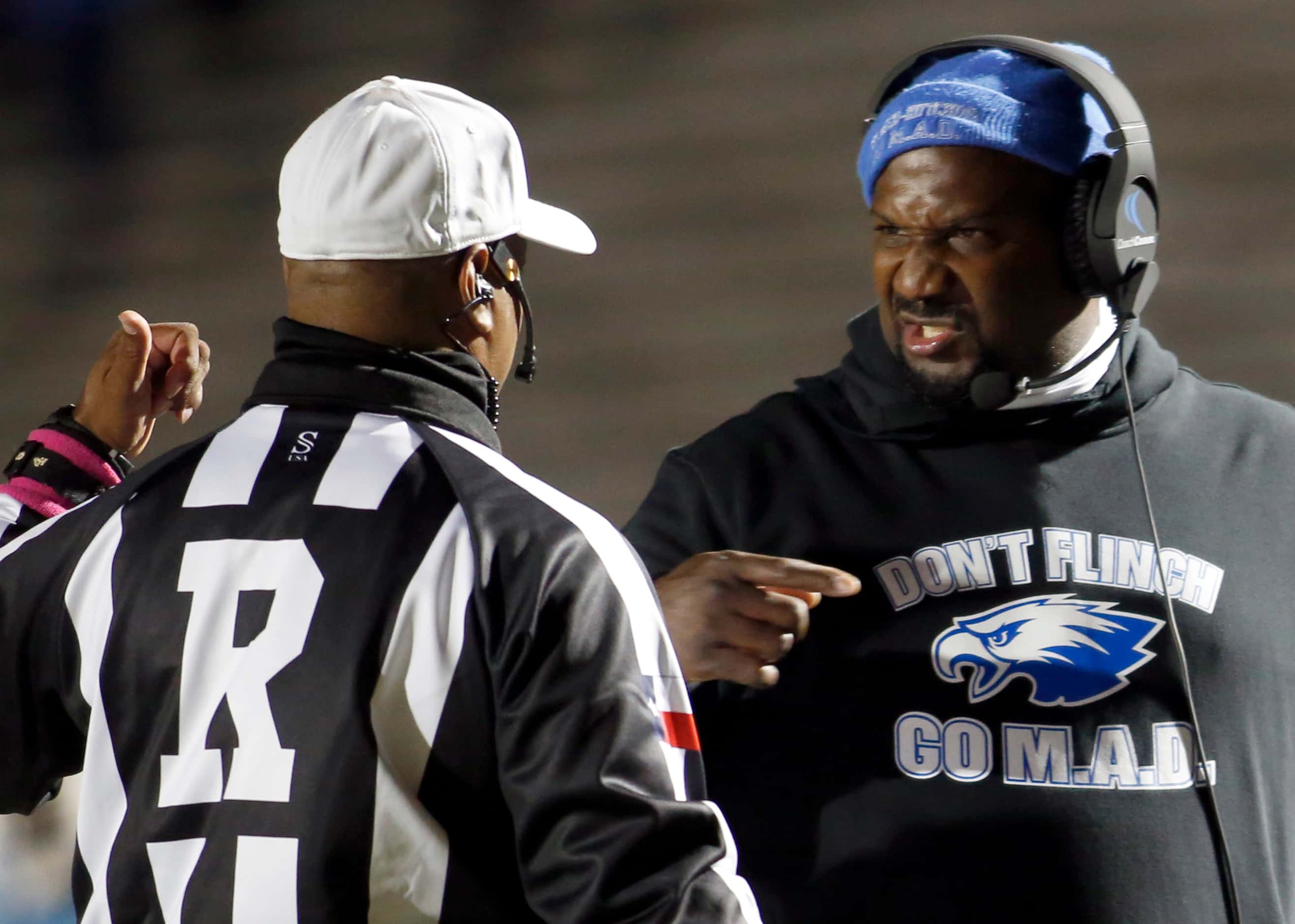 Wilmer Hutchins head coach Elzie Barnett reacts from a game official's call during first...