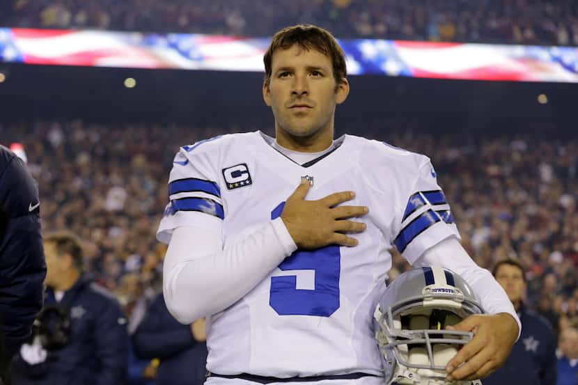 File- This Dec. 30, 2012 file photo shows Dallas Cowboys quarterback Tony Romo (9) standing...