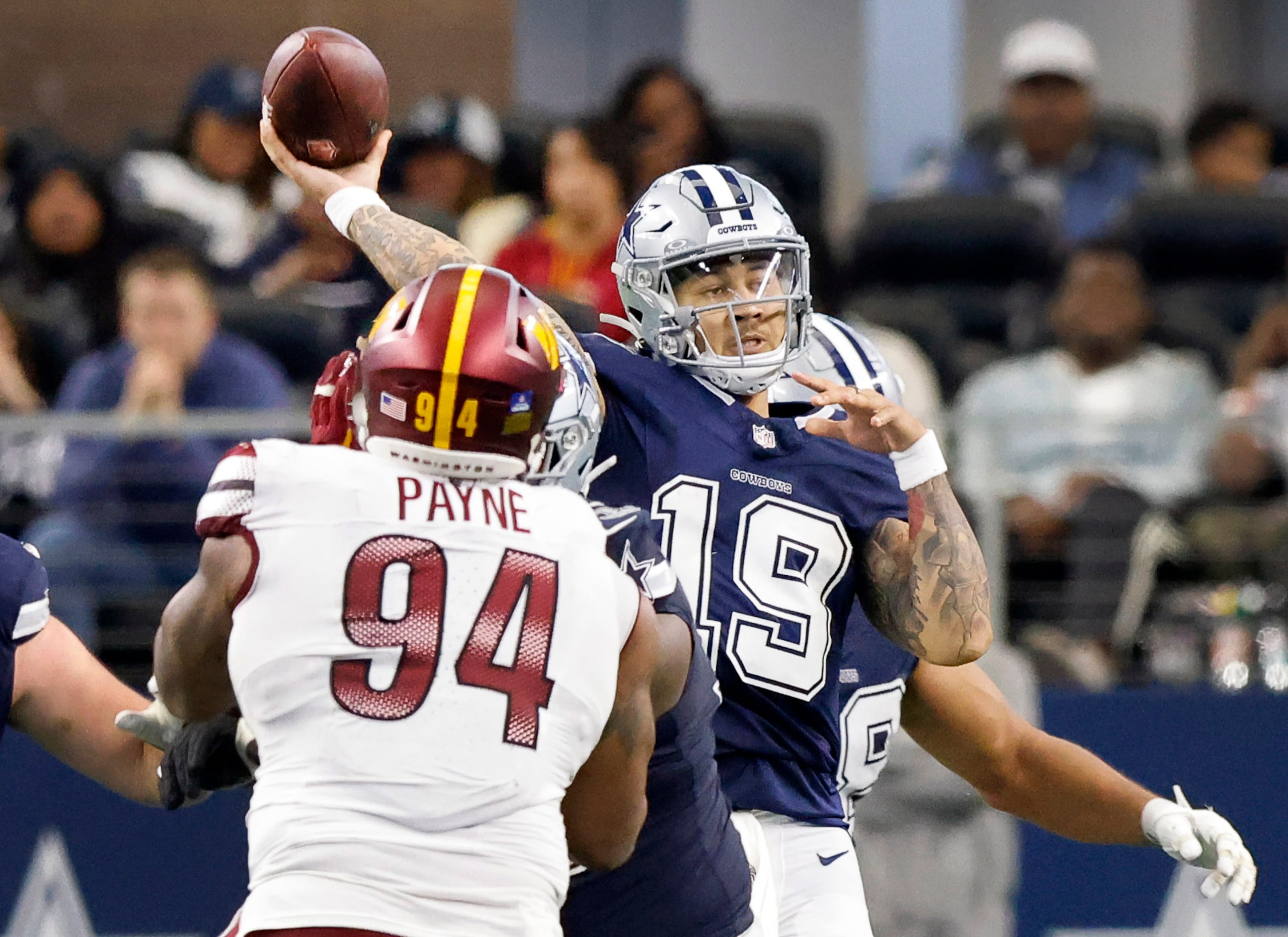 Dallas Cowboys quarterback Trey Lance (19) throws a deep pass against the Washington...